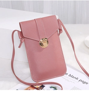 Detailed view of dust pink faux leather crossbody phone bag with gold metal buckle