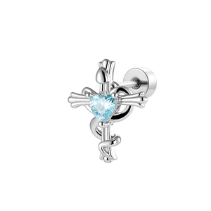 Silver snake coiled cross stud earring with light blue heart gemstone on white background