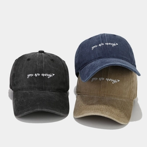 Three washed cotton baseball caps in black, navy, and khaki with you are enough embroidery