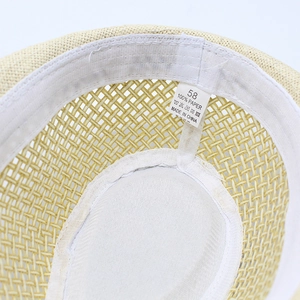 Detailed macro view of the inner band, paper straw weave, and size 58 product label