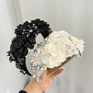Detail of 3D embroidered floral headband with crystals and beads for elegant occasions