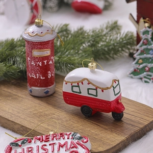 Christmas resin ornaments set with mailbox and RV on a rustic wooden tray for tree decor