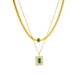 Double-layered gold necklace featuring green zircon squares and a white shell texture pendant