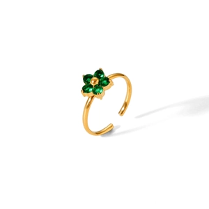 Detailed top view of gold adjustable ring featuring a four-petal green zircon flower