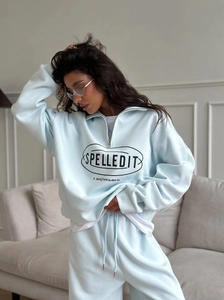Women's light blue half-zip sweatshirt and straight trousers set with Spelledit print
