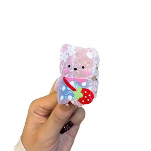 Cute acrylic pink bear hair claw clip with strawberry bag and blue polka dots design