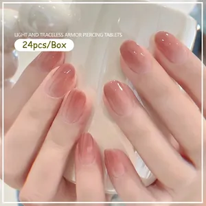 Pink gradient press-on nails 24pcs set featuring a glossy short natural design