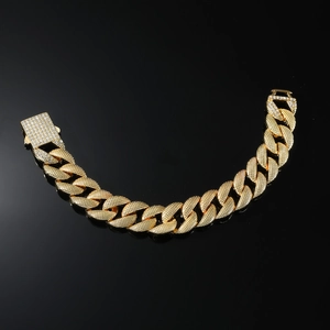 Gold iced out Cuban link bracelet with sparkling rhinestones and square buckle clasp