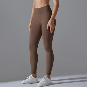 Side view of high-waisted seamless brown yoga leggings with squat-proof fabric