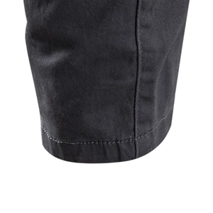 Close-up of black cotton twill fabric showing detailed stitching and premium material texture