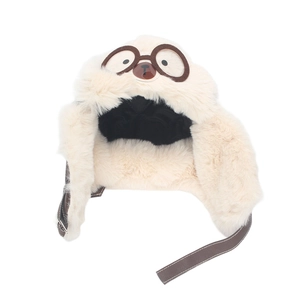 Detail of plush faux fur aviator hat with bear decor and quilted lining for kids