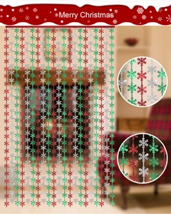 Detail view of glittery red, green, and silver snowflake streamers for Christmas decor