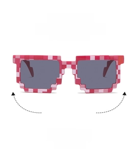 Detail view of pink pixelated mosaic sunglasses with dark grey lenses in blocky style