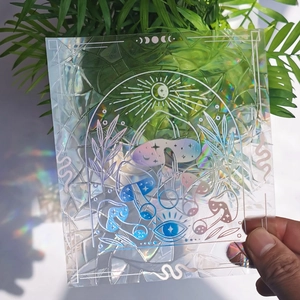 Detailed holographic suncatcher sticker featuring sun moon and mushroom with rainbow effect