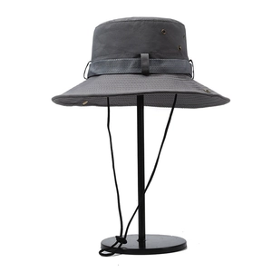 Outdoor sun hat with wide brim, drawstring and vents for fishing and hiking