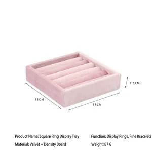 Pink velvet ring display tray with dimensions showing a five-slot jewelry storage design