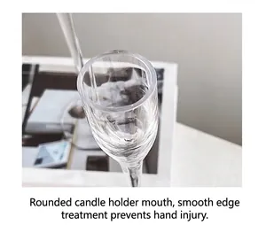 Detail of clear glass candle holder with smooth rounded rim for safety and comfort