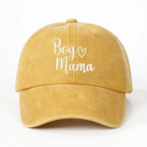 Detail of Boy Mama embroidery and heart pattern on washed cotton baseball cap