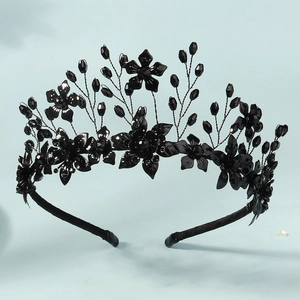 Detail of handmade black flower crown headband with dark beads for Halloween parties