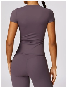 Rear view of mauve quick-dry yoga set featuring slim-fit T-shirt and high-waist leggings