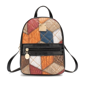 Women's patchwork leather backpack with diamond quilted pattern and gold zipper detail
