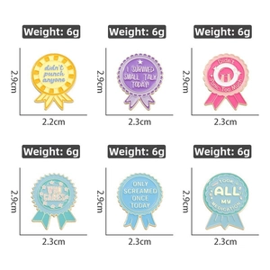 Macro detail of various colorful enamel medal badges with humorous English text on white background