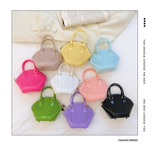 Detailed macro view showing a collection of colorful mini woven texture jelly bags
