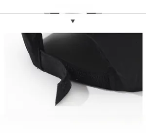 Detail of adjustable velcro strap on the back of the black sun hat for custom sizing