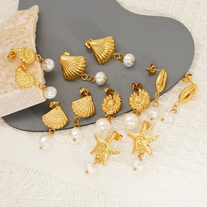 Golden ocean theme earring set with starfish and seashell charms and pearls