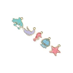 Enamel ocean animal charms set featuring shark, seahorse, and jellyfish alloy pendants