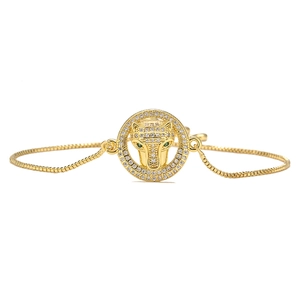 Luxurious gold-plated leopard head bracelet with white zircons and green gemstone eyes