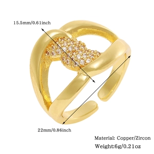 Macro shot of gold-plated copper ring with micro-pave zircons and adjustable opening