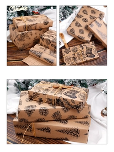 Close-up of vintage brown Kraft Christmas wrapping paper with pine cones and tree prints