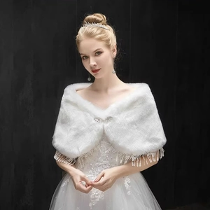 Elegant white faux fur bridal shawl with beaded tassels and sparkling rhinestone buckle