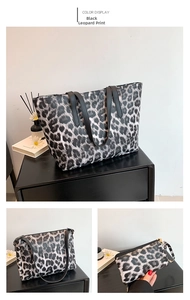 Detail of leopard print tote bag and matching zipper pouch set on black cabinet