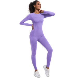 Completo fitness viola senza cuciture da donna con top a maniche lunghe e leggings
