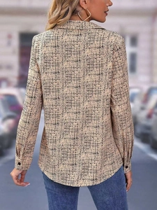 Women's long-sleeve casual printed shirt in apricot with black stone pattern, back view