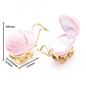 Pink velvet baby stroller jewelry box showing dimensions and open-closed views