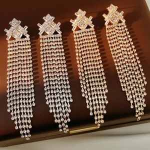 Vintage long tassel earrings with sparkling crystals in gold and silver finish