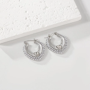 Elegant heart-shaped silver earrings with pearls and a center heart-cut zircon crystal