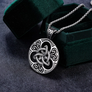 Silver Viking Celtic knot pendant necklace on dark velvet box with high metal gloss