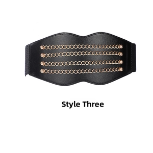 Detail of wide black elastic waist belt with quad gold chain and rivet accents