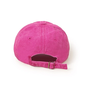 Detail view of pink washed cotton baseball cap with adjustable metal back buckle strap