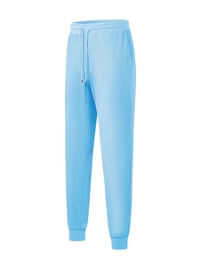 Detailed view of light blue waffle knit texture and drawstring waist on men's sports pants