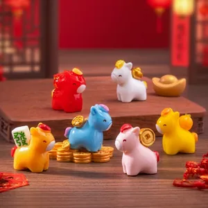 Miniature resin horse figurines with Chinese lucky charms on festive red background