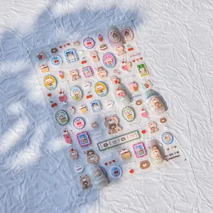 Close-up of embossed nail stickers featuring cute cartoon bears and dessert patterns