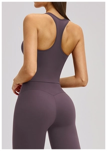 Detail of the racerback design on a purple quick-dry athletic yoga top with seamless fit