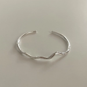 Minimalist S925 sterling silver Mobius bracelet with irregular twisted wave texture