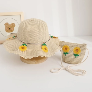 Set cappello di paglia per bambini e borsa girasole con fiori tessuti e tesa a onde