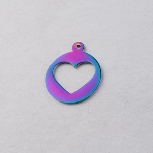 Detail of round hollow heart pendant with rainbow metallic finish for jewelry making